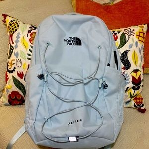 Light blue North Face back pack